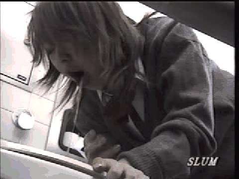 Jap girl in white and black pukes! vomit