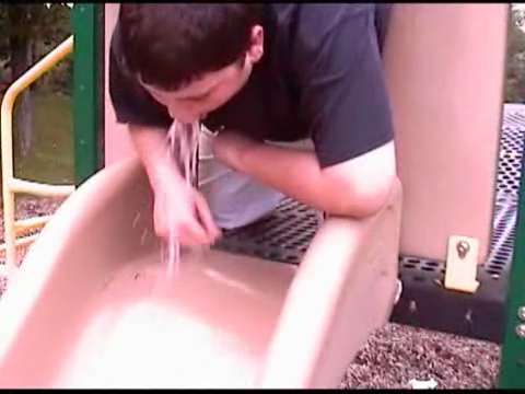 Cute Kid Puking Down A Chute vomit