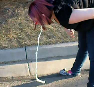 Chubby Monica pukes on the street vomit