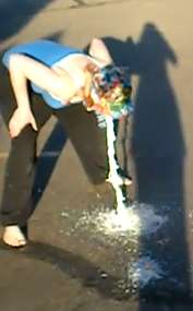 Girl pukes massively on street vomit