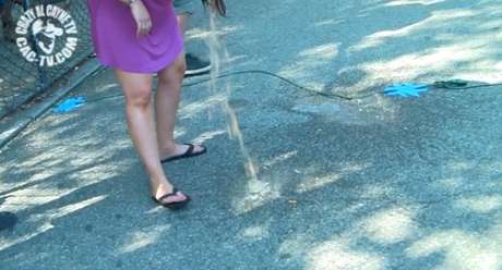 Lady throwing up on the sidewalk at Coney Island vomit