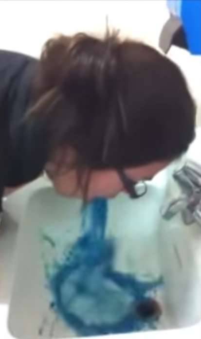 Blue stream into the sink vomit