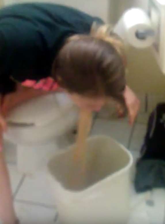 She empties out in a hotel bathroom vomit