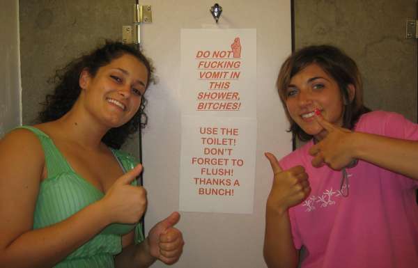 Posted notice against vomiting vomit