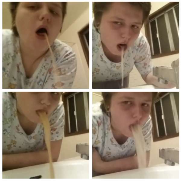 She'd rather watch the camera than what she's doing vomit