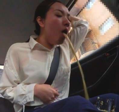 Puking in her lap vomit