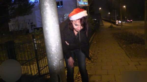 Girl in Santa hat upchucks vomit