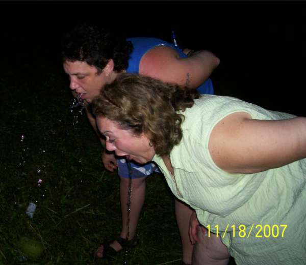 Two chicks hurl vomit