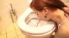 Redhead on the side of the toilet vomit