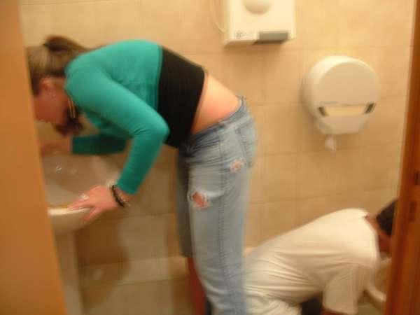 Girl and some guy puking vomit