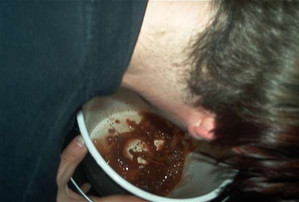 Tim vomiting in a bucket vomit