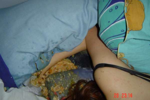 Girl laying on her own vomit! vomit